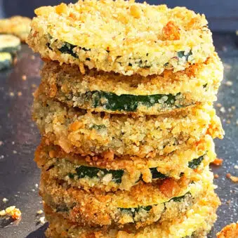 Stack of Easy Oven Baked Zucchini Chips on Baking Tray