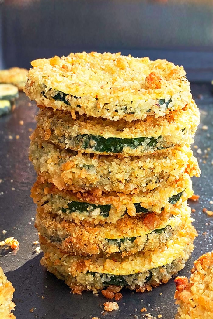 Stack of Easy Oven Baked Zucchini Chips on Baking Tray