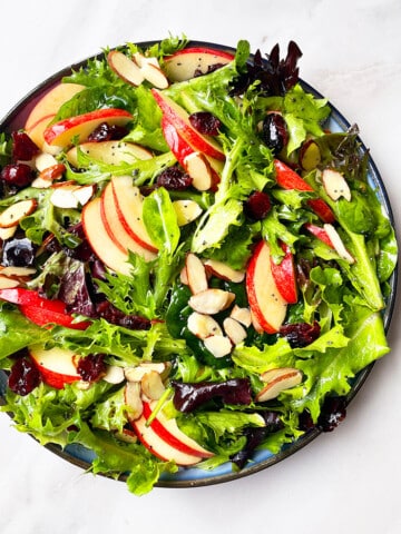 Easy Fall Apple Salad With Maple Cider Vinaigrette in Black Dish- Overhead Shot