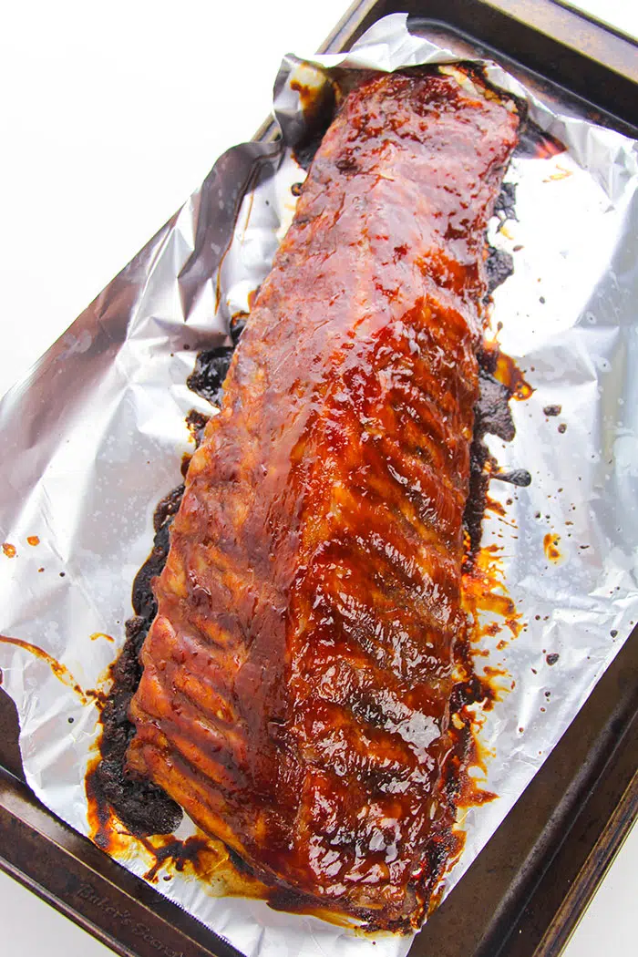 Fall Off The Bone Baby Back Ribs on Oven Tray With Foil- Final Process Shot