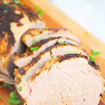 Easy Tender Moist Instant Pork Tenderloin Slices on Brown Cutting Board