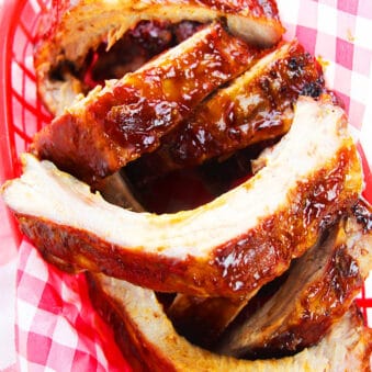 Easy Sticky Tender Fall off The Bone Instant Pot BBQ Ribs Served in Red Dish
