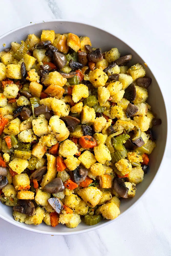 Easy Homemade Instant Pot Vegetarian Stuffing Served in Gray Bowl on White Background- Overhead Shot