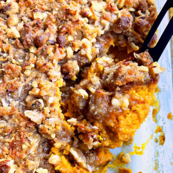 Easy Fluffy Sweet Potato Casserole With Crumbled Butter Pecan Brown Sugar Topping in Glass Dish