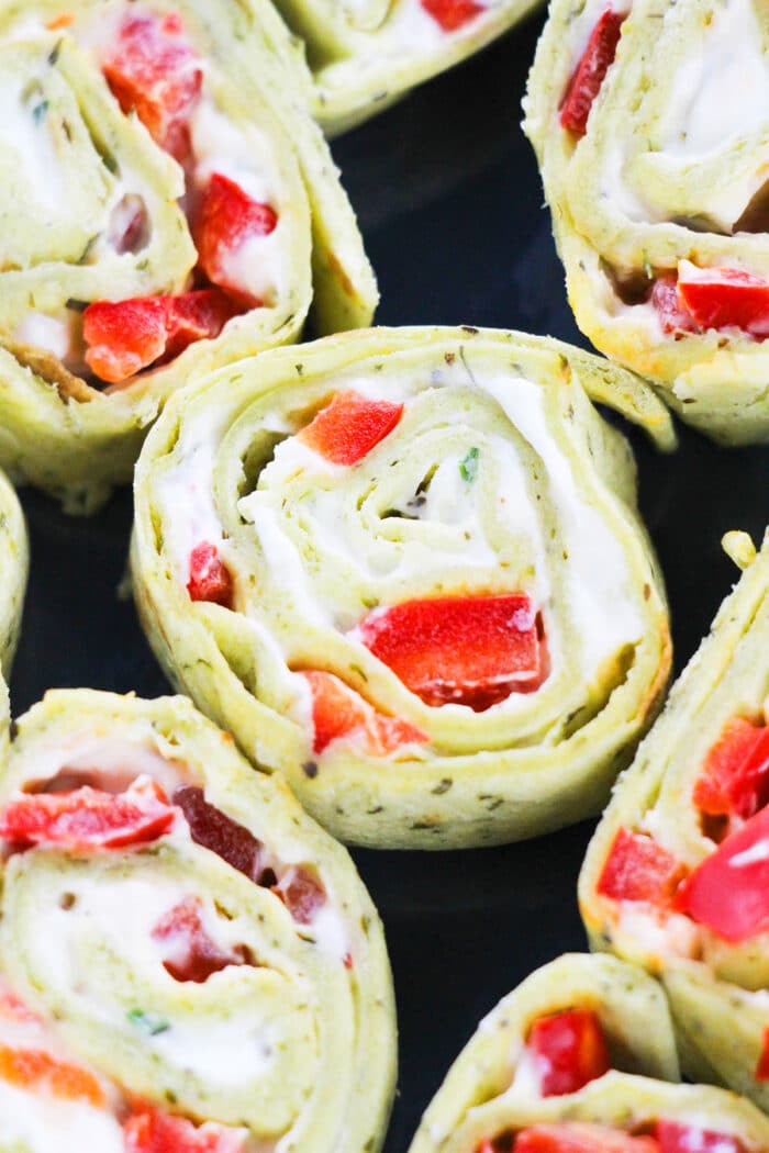 Closeup Shot of Pinwheel Sandwiches With Ranch Cream Cheese and Peppers.