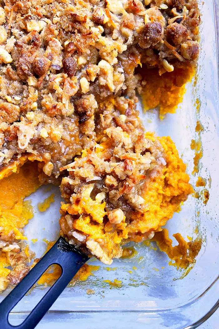 Sweet Potato Casserole With Crumbled Brown Sugar Topping in Glass Dish