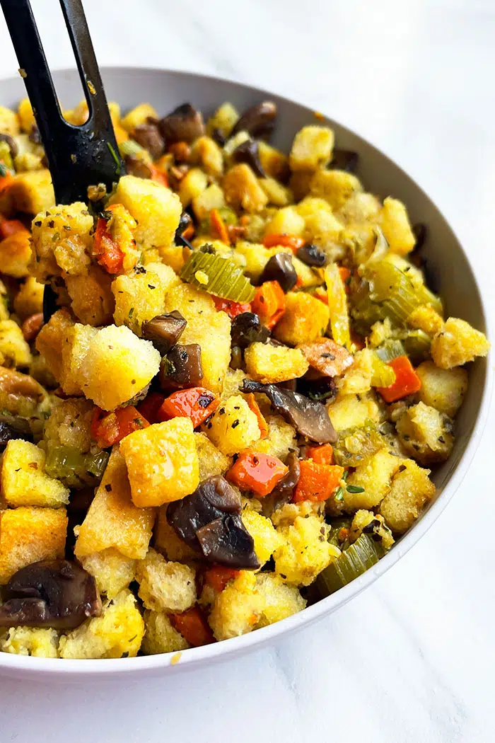 Easy Mushroom Stuffing in Gray Bowl With Black Spoon