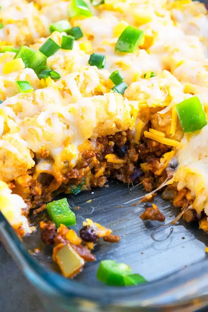 Easy Mexican Tater Tot Casserole in Glass Dish- Closeup Shot