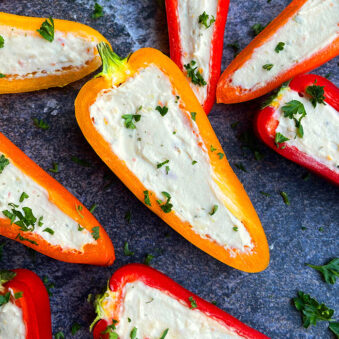 Easy Cream Cheese Stuffed Mini Peppers (Sweet Peppers) on Rustic Gray Background