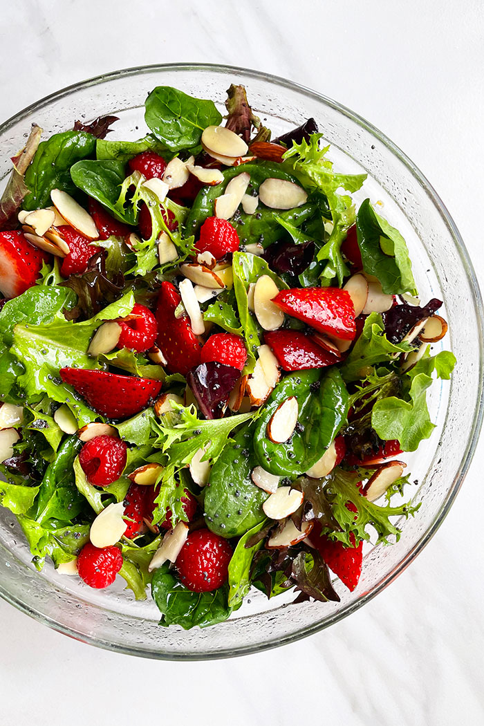 Holiday Salad With Jam Vinaigrette in Glass Bowl
