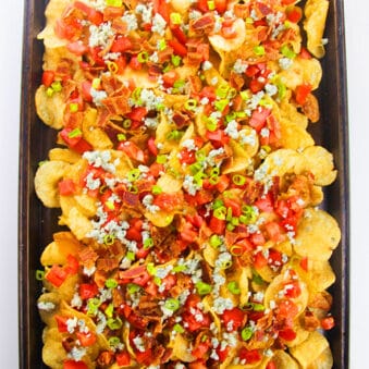 Easy Loaded Sheet Pan Irish Nachos on White Background