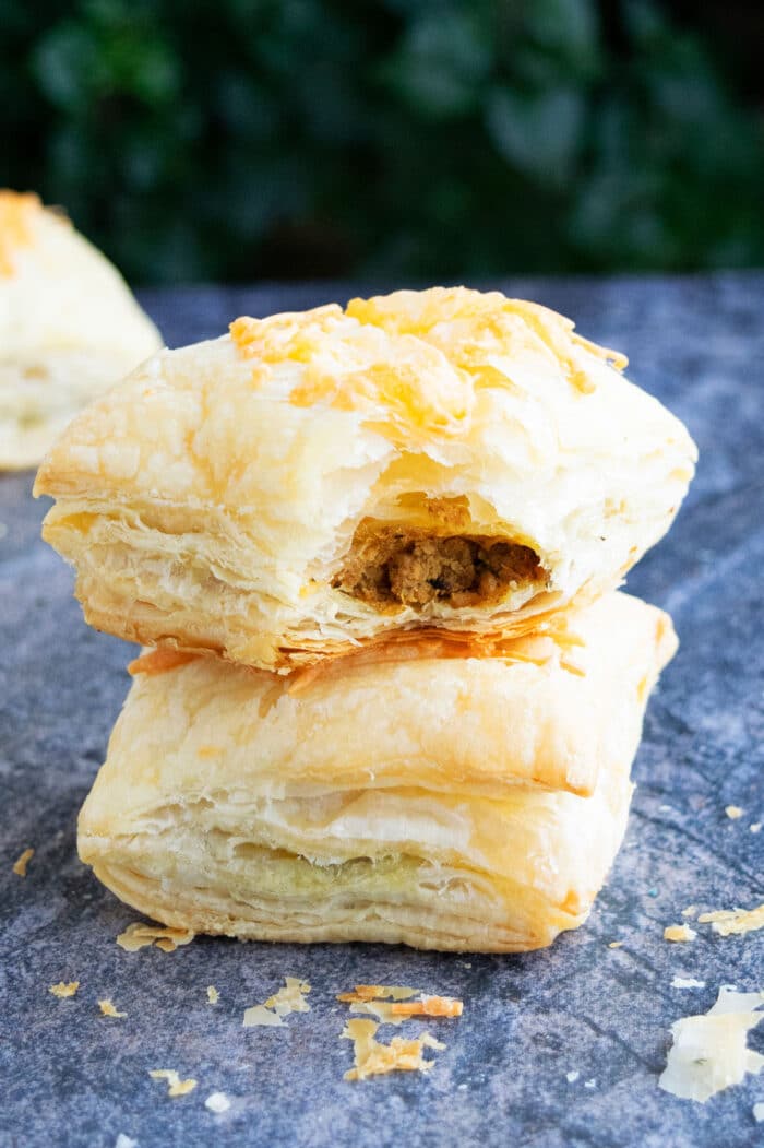 Stack of Ground Beef Puff Pastry on Rustic Gray Background. 