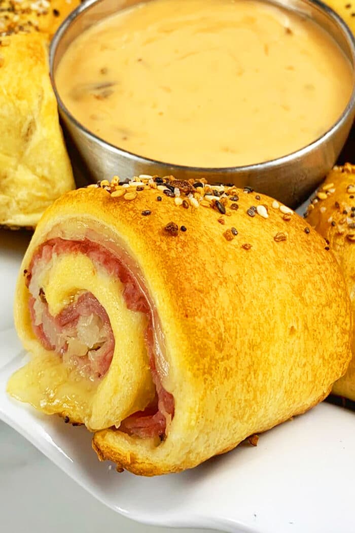 Reuben Roll Ups on White Plate- Closeup Shot.