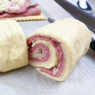 Dough rolled into a pinwheel and cut into slices.