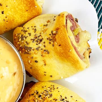 Baked rolls on white dish- Overhead shot.