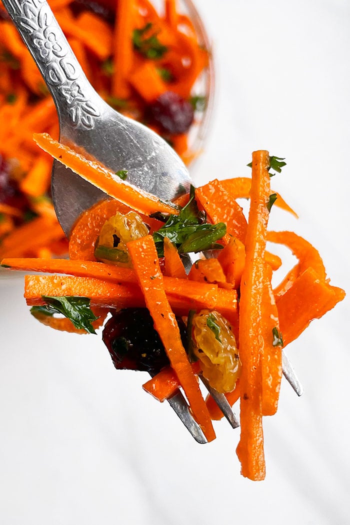 Fork Full of Grated Carrot Salad- Closeup Shot 