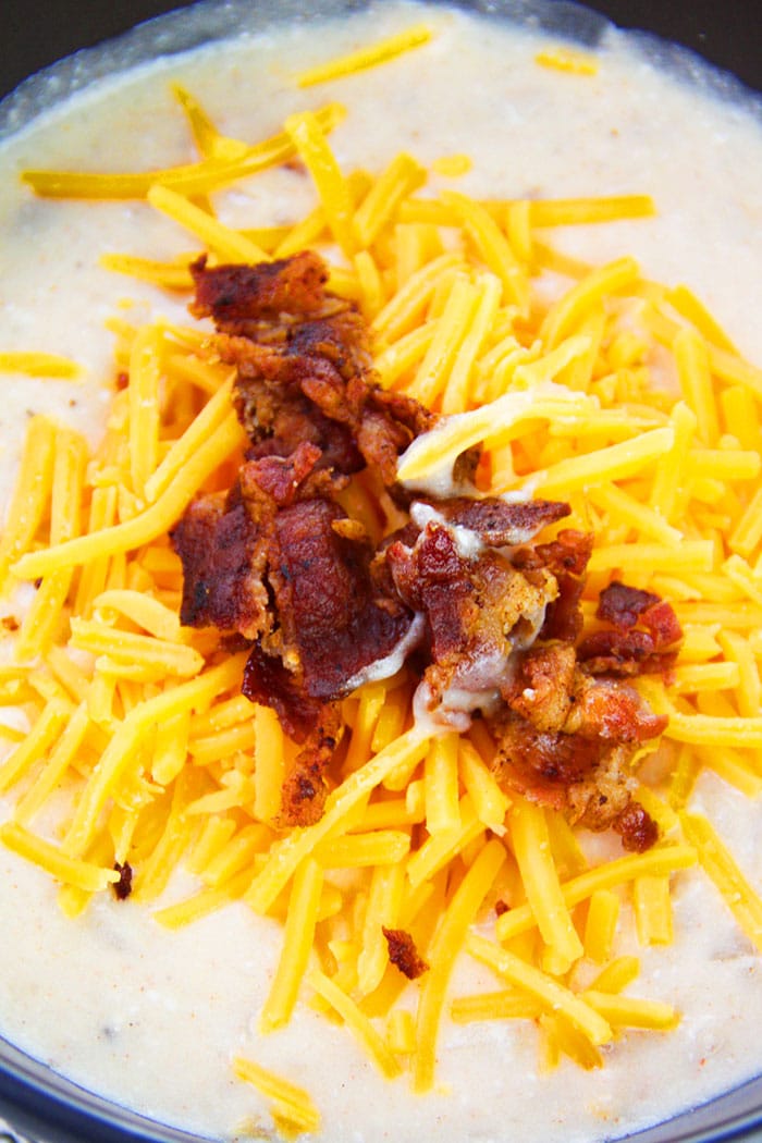 Closeup Shot of Soup Toppings- Shredded Cheddar Cheese and Bacon Bits