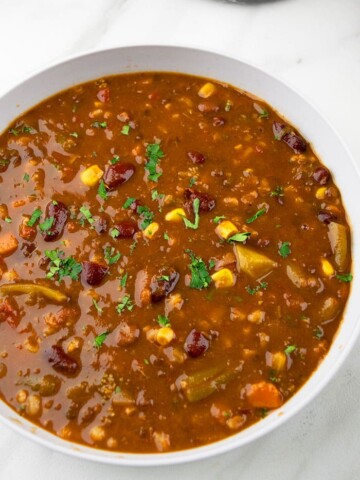 Easy Instant Pot Turkey Chili in Gray Bowl on White Background