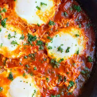 Best Shakshuka Eggs With Feta In Black Pan