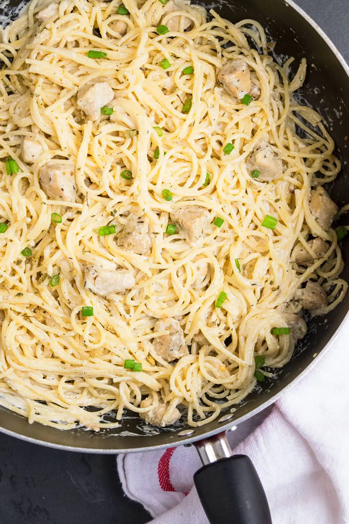 Creamy Garlic Chicken Pasta in Black Nonstick Pot. 