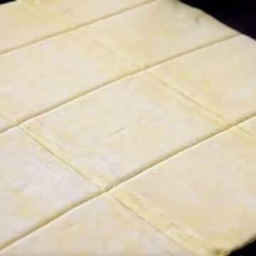 Puff pastry sheet cut into squares. 