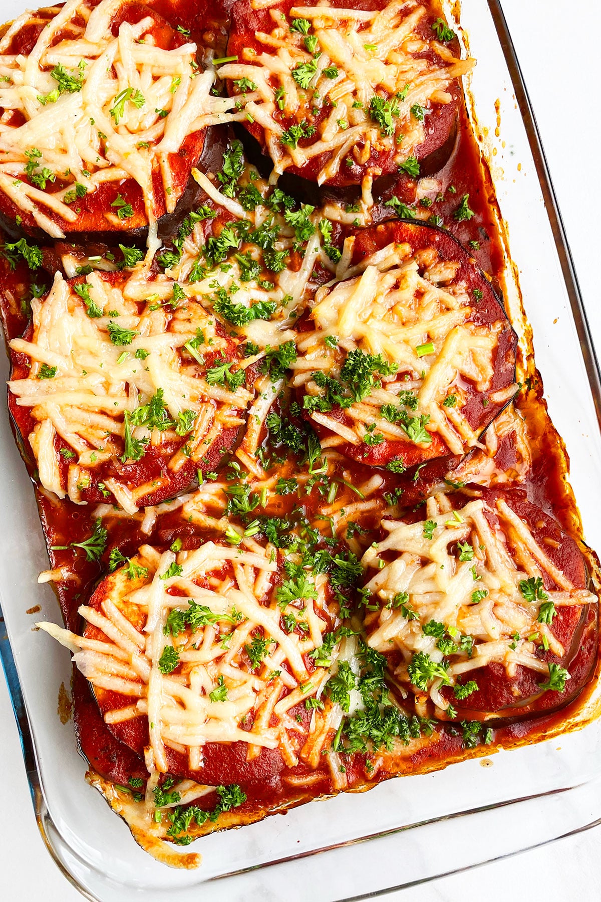 Overhead Shot of Easy Eggplant Lasagna Without Noodles or Meat in Glass Dish. 