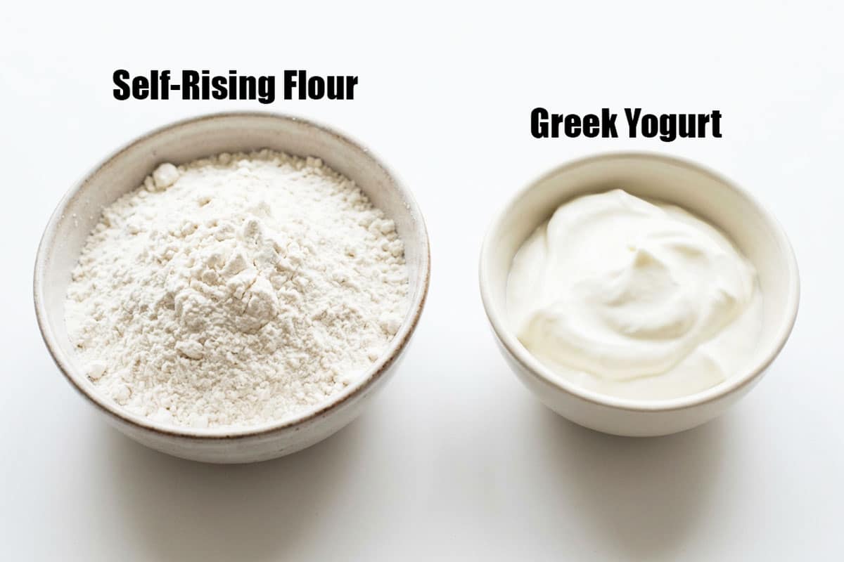 Ingredients for recipe on white background- flour and yogurt. 